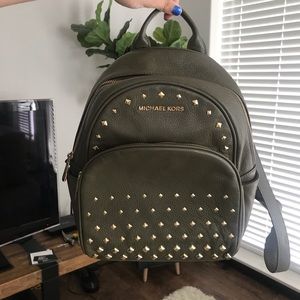 Like new— olive green Michael Kors mini Backpack
